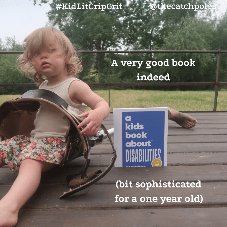 Viola sits grumpily in James's prosthetic leg. The book is propped next to her. Text reads: 'A very good book indeed. Bit sophisticated for a one year old