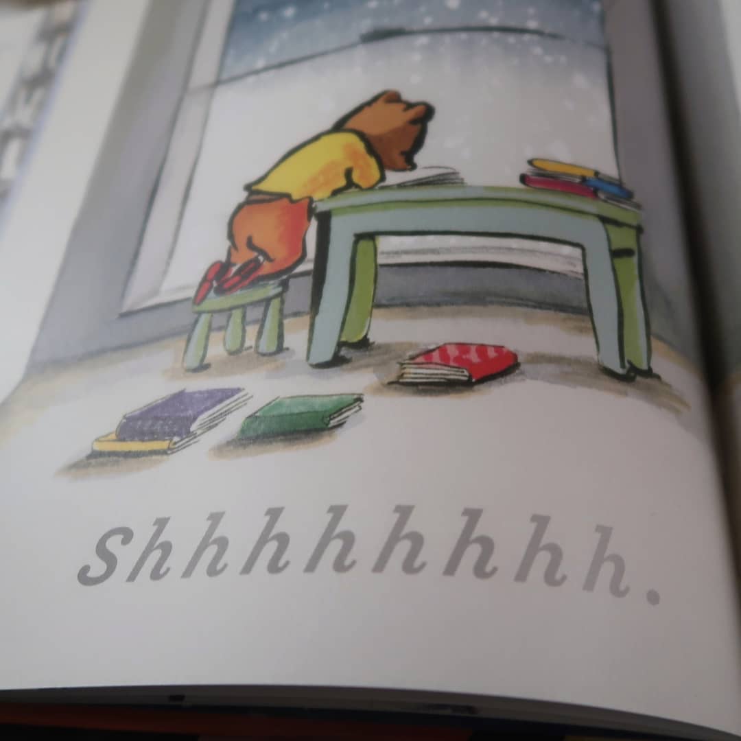 A close-up of a page. Small bear is alone and looking down, perhaps reading. "Shhhhh". It's a very evocative page.