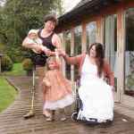 Lucy and James Catchpole - a disabled couple - with their two daughters.