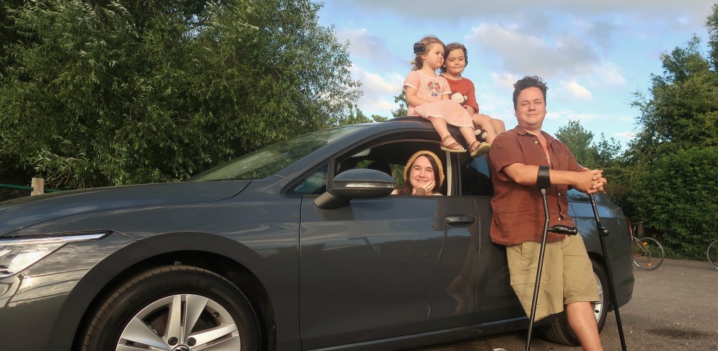 Lucy, James, Mainie and Viola Catchpole with their new car